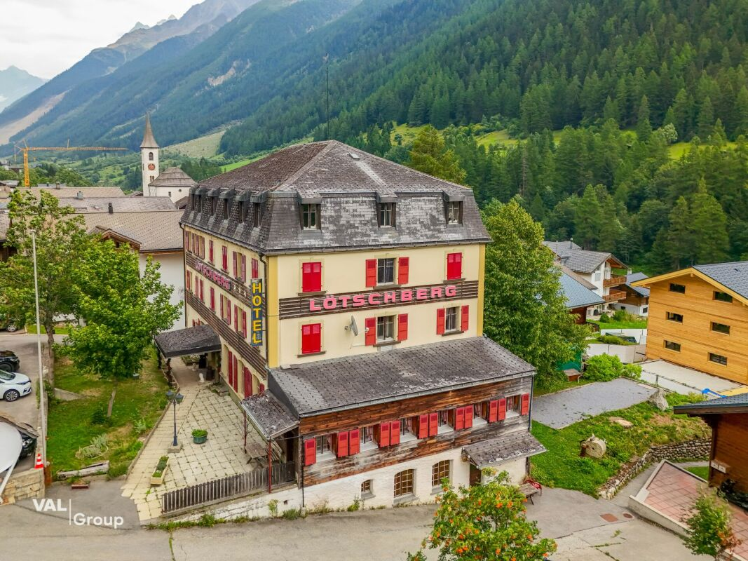 Former hotel with exceptional potential, enjoying a dreamlike panoramic location in Lötschental
