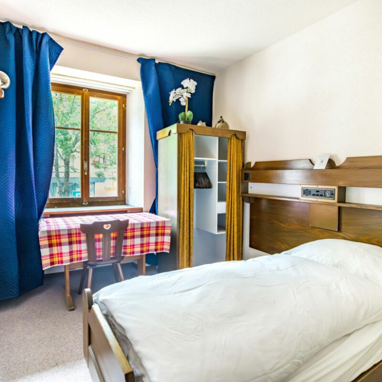 Former hotel with exceptional potential, enjoying a dreamlike panoramic location in Lötschental