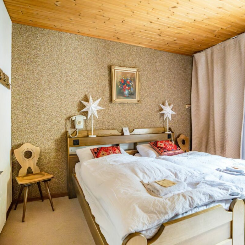 Former hotel with exceptional potential, enjoying a dreamlike panoramic location in Lötschental