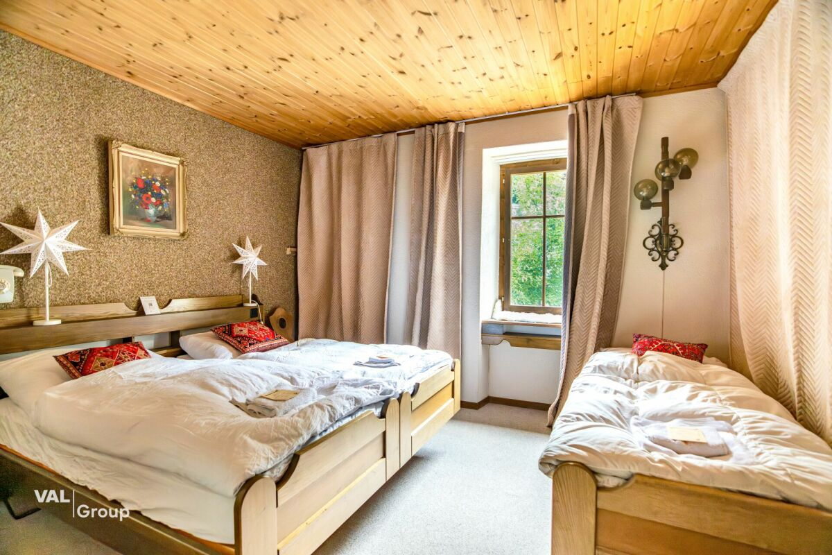 Former hotel with exceptional potential, enjoying a dreamlike panoramic location in Lötschental