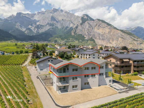 Appartement mansardé lumineux avec balcon et deux places de parking