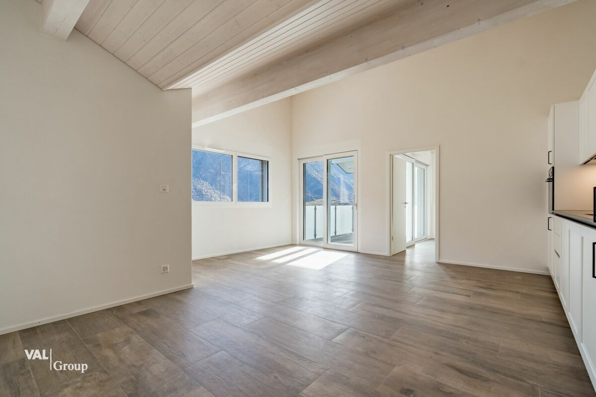 Appartement mansardé lumineux avec balcon et deux places de parking